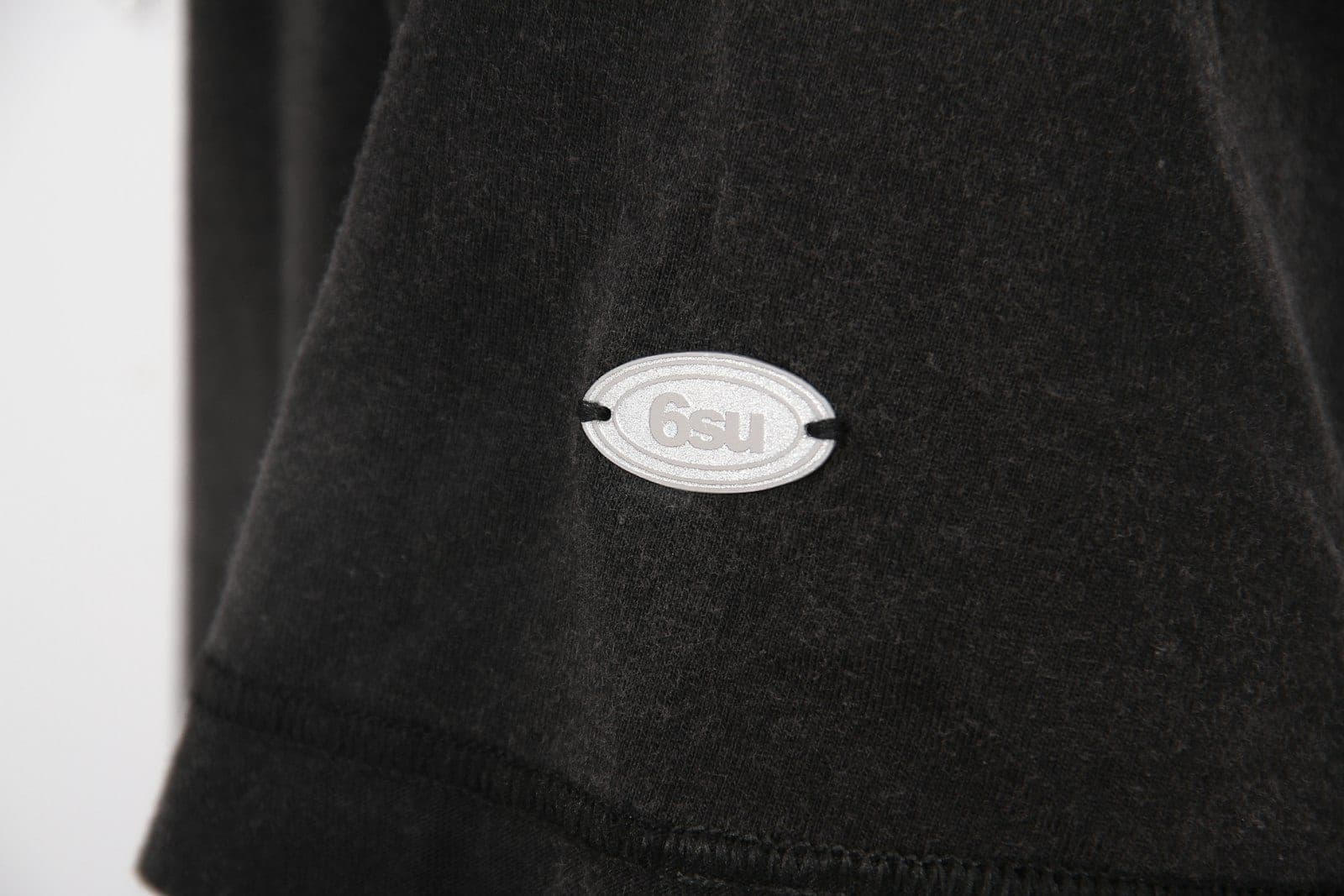 Brand logo tag stitched onto a garment